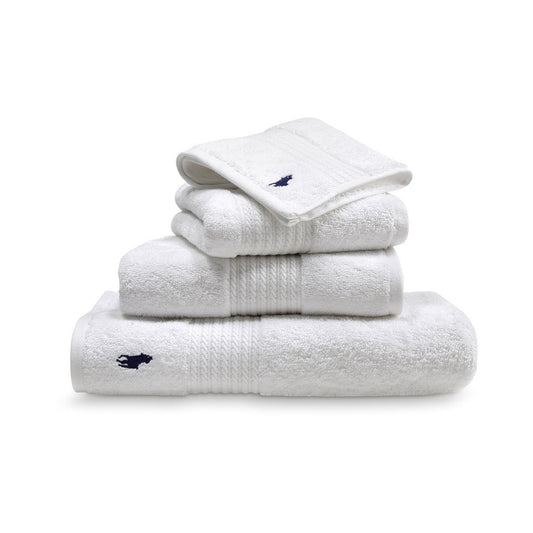 Comment laver une serviette de bain ? Guide complet pour garder des serviettes douces et absorbantes