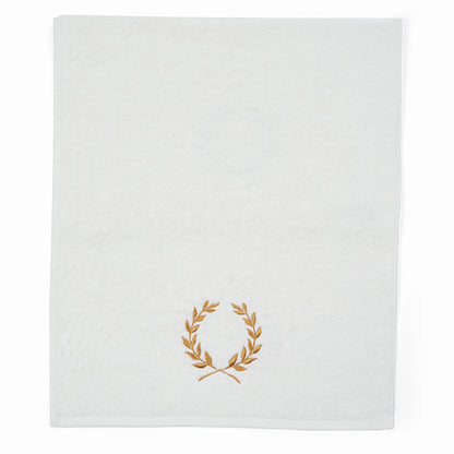 Serviette de toilette brodée de pétales d'or