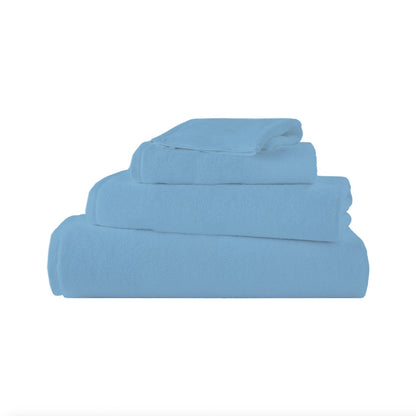 Serviette 100% coton peigné – Excellente absorption pour une peau fraîche et sèche.
